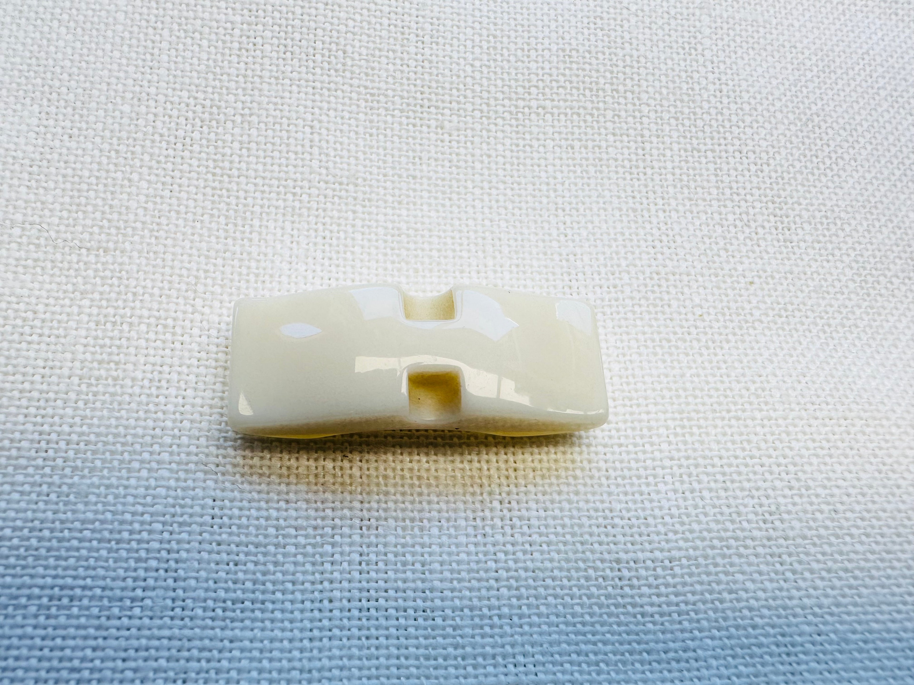 38mm Iridescent Cream Flat Shank Toggle Button