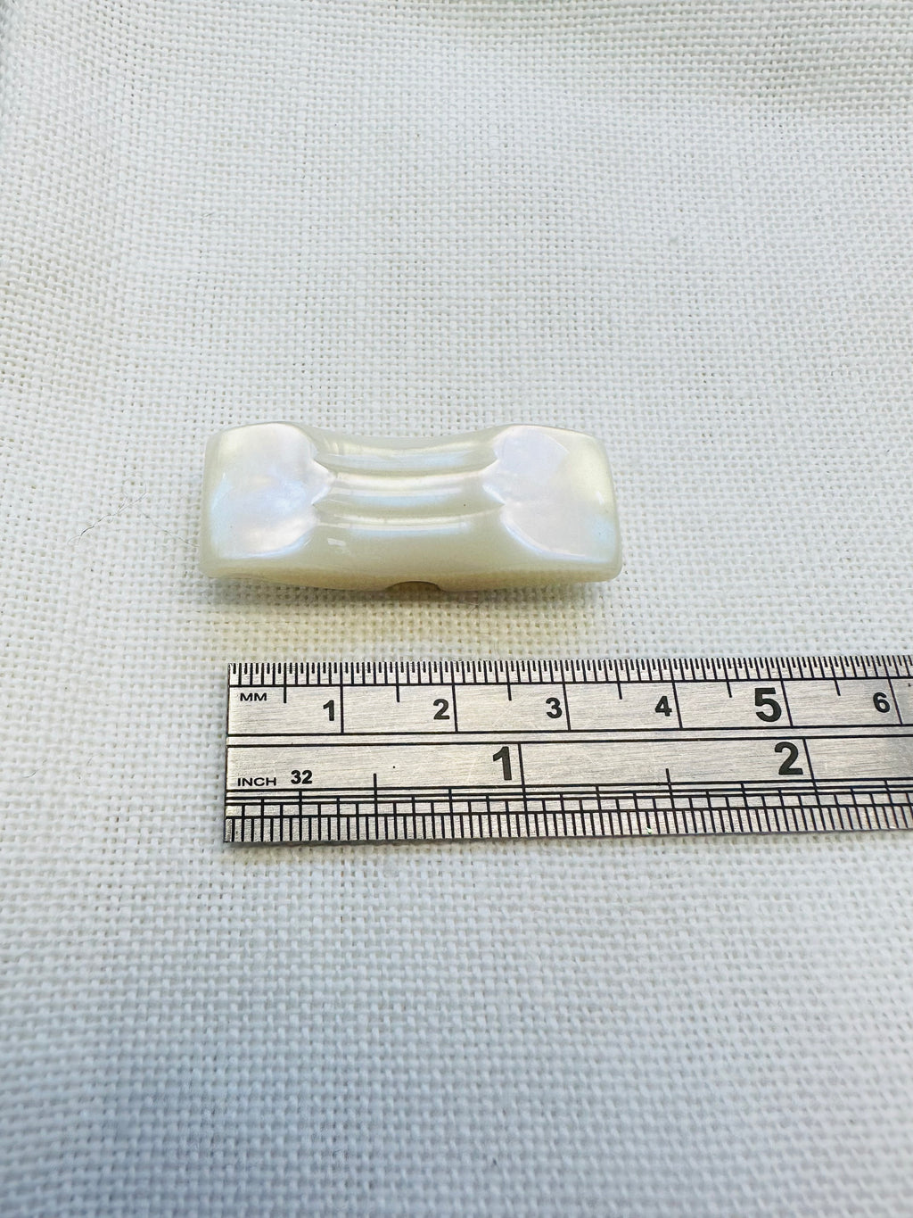38mm Iridescent Cream Flat Shank Toggle Button