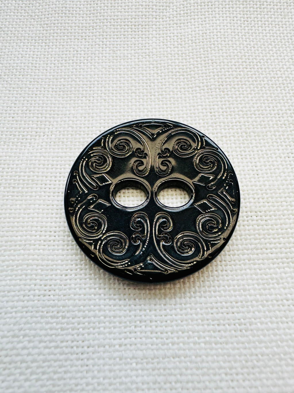 Black Engraved Button with Gold Effect Detail – 34mm