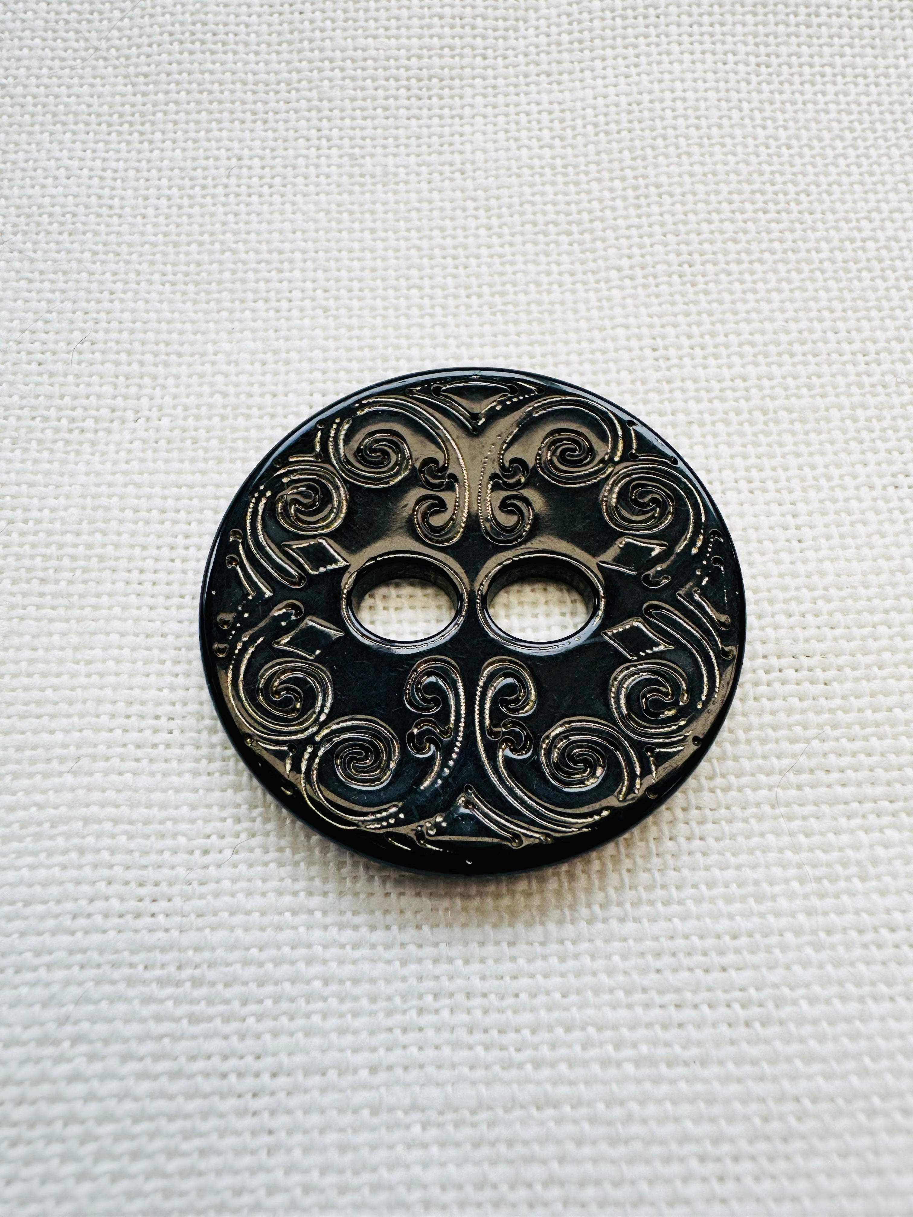 Black Engraved Button with Gold Effect Detail – 34mm
