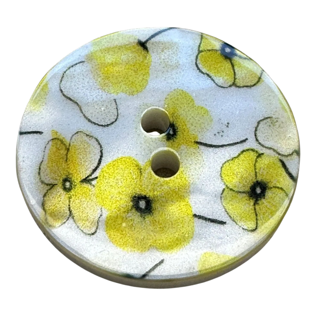 Yellow flower button 23mm on a white pearl background sold individually