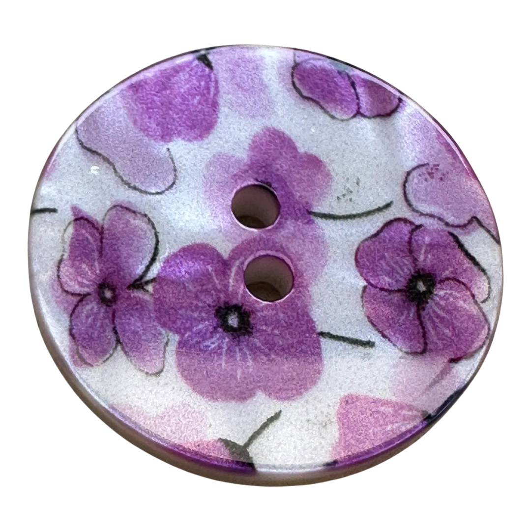 Cerise flower button pearlised on a white back ground sold individually